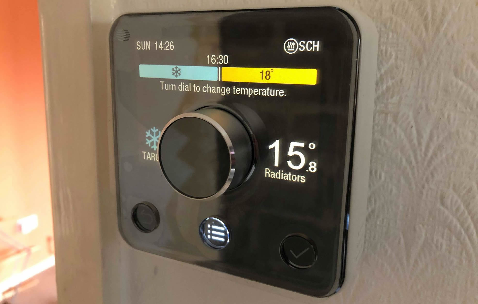 Hive thermostat installer London fitting smart thermostat and configuring heating controls